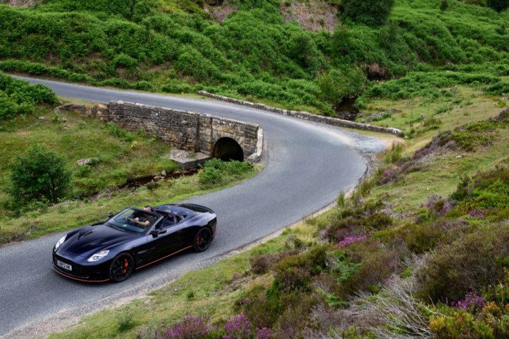 Vanquish sports car showcasing sleek design and dynamic performance, appealing to automotive enthusiasts and luxury car bu...