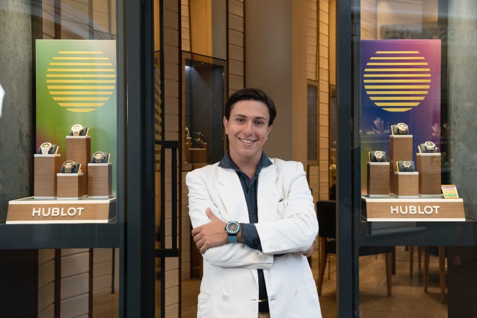 Andrea showcasing a collection of luxury watches, emphasizing rare and vintage timepieces.