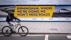 HS2 construction progress at Birmingham station with cranes and workers, highlighting UKs high-speed rail project development
