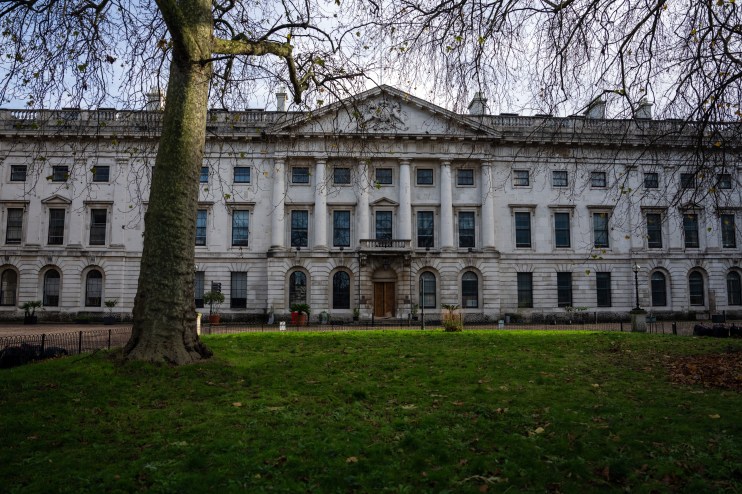 China embassy at Royal Mint Court, featuring diplomatic architecture in a business district setting.