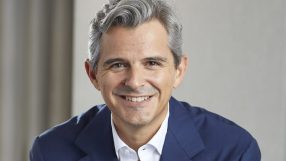 Filippo Goris 2021 headshot showcasing a professional and approachable demeanor for his biography on a news/business website