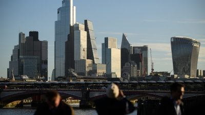 GettyImages 2244121938 displaying a professional business meeting with diverse executives discussing strategic plans in a ...