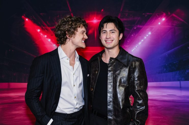 GettyImages 2248297215 featuring a significant news event, capturing key figures in a business setting discussing strategy.