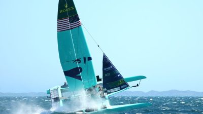 GettyImages 2256016480 showing a business meeting with diverse professionals discussing strategies around a conference table