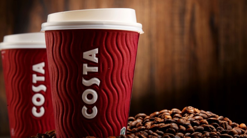 Getty Images promotional visual with a diverse group of professionals collaborating in a modern office setting.