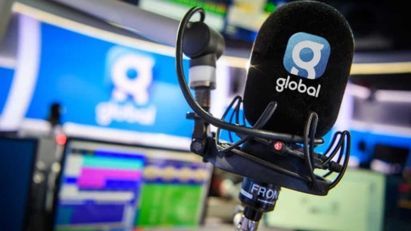Global microphone symbolizing international communication and connectivity on a business news backdrop