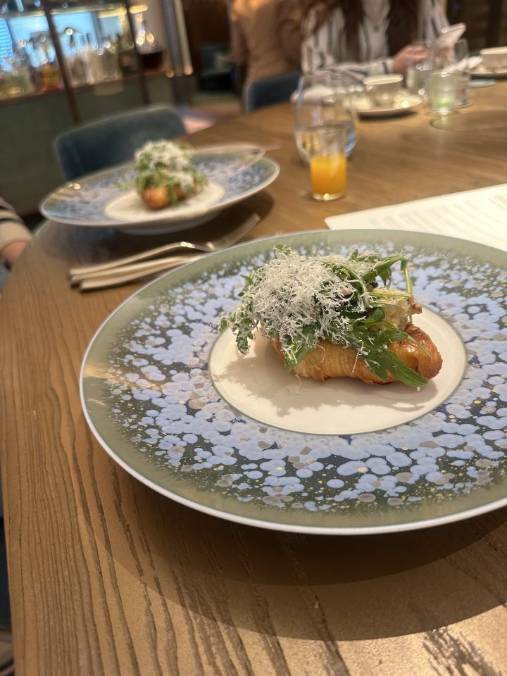 Breaking news event with business professionals discussing market trends at a conference table, emphasizing collaboration ...