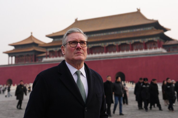 Keir Starmer meeting officials during his diplomatic visit to China, discussing international relations and trade policies.