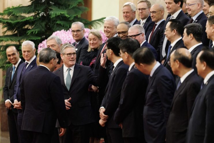 Keir Starmer addressing diplomatic relations with China at a press conference, emphasizing economic and political strategies