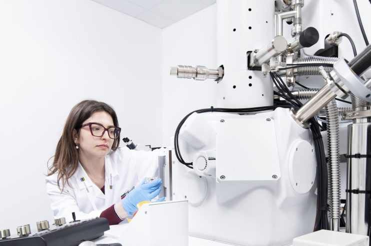 Young adults in classroom engaged in hands-on technical education amid rising NEETs crisis, highlighting education reform ...