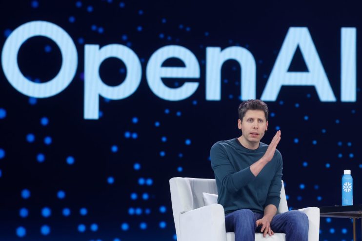 Sam Altman discussing OpenAIs ChatGPT advancements at a press conference, emphasizing AI innovation and future developments
