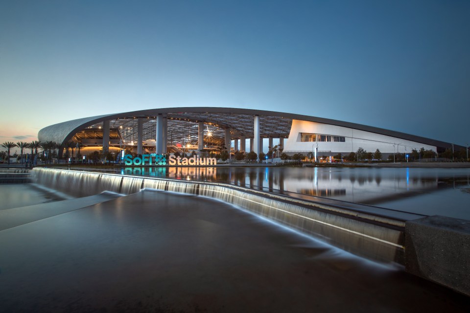 SoFi Stadium illuminated at sunset with vibrant sky, highlighting architecture and evening ambiance in sports news context.