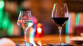 Fine wine collection showcased in elegant glassware, highlighting premium vintage selections in a refined setting.