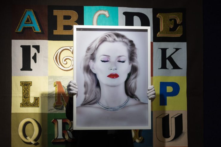 Visitors explore exhibits at a renowned art museum, showcasing diverse collections and fostering cultural appreciation.