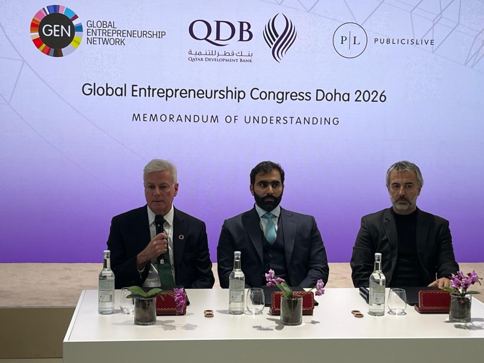 Breaking news update with journalist at desk, laptop open, stack of papers nearby, capturing the essence of real-time repo...