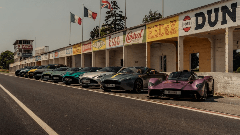 Breaking news event with gathered crowd and reporters, featuring a podium and speaker addressing the media in a city setting