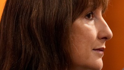 Keanu Reeves looking contemplative, highlighting his expressive face, suitable for a news article on his recent film project.