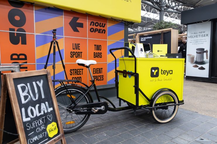 General news image featuring diverse individuals in a professional setting, engaging in a collaborative discussion.