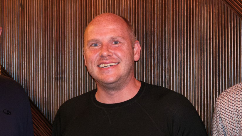 Adobe Express interface showcasing design tools and features for creative projects on a business news website