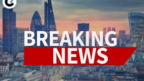 Breaking news update banner on a business website with a headline and icons against a dynamic blue background