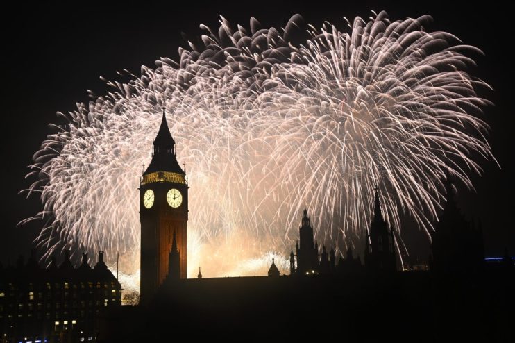 Big Ben towering against a clear blue sky, showcasing Londons iconic clock tower and historic architectural details
