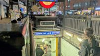 Chancery Lane station entrance, bustling with commuters during peak hours, highlighting Londons vibrant public transport s...