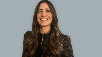 Chiara Caldwell speaking at a press conference, expressing views on recent developments in the general news sector.