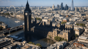 Westminster skyline highlighting political landmarks under cloudy skies, symbolizing political uncertainty and risk analysis.