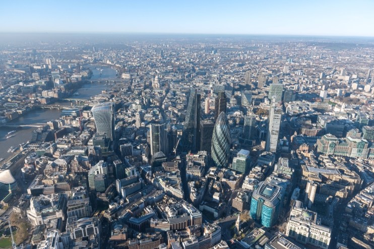 Aerial view of city cluster looking west, showcasing urban development and architectural landscape in 2017