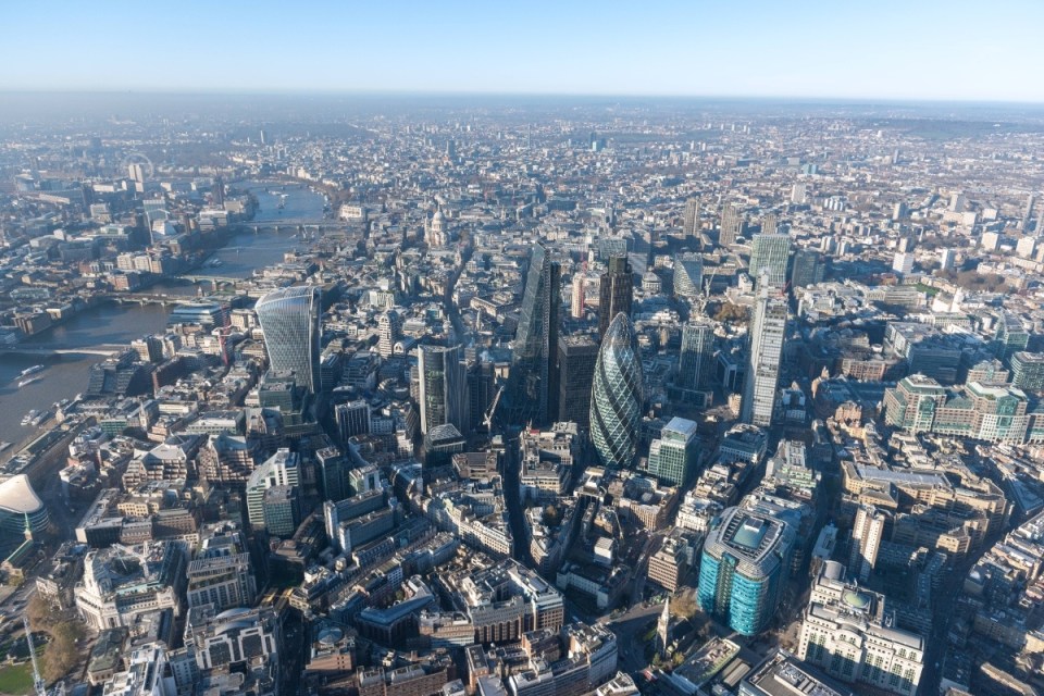 Aerial view of city cluster looking west, showcasing urban development and architectural landscape in 2017