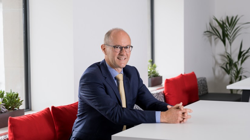 David Sleath, Chief Executive Officer, in a business setting, conveying leadership and professionalism.