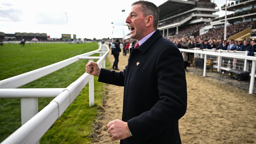 GettyImages 2203957177: Intricate cityscape showcasing bustling urban life and modern architecture under a clear blue sky