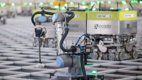 Business professionals discussing market trends in a modern conference room, highlighting collaboration and strategic plan...