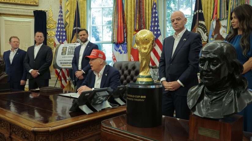 A professional business meeting with diverse executives discussing a strategic plan in a modern conference room.