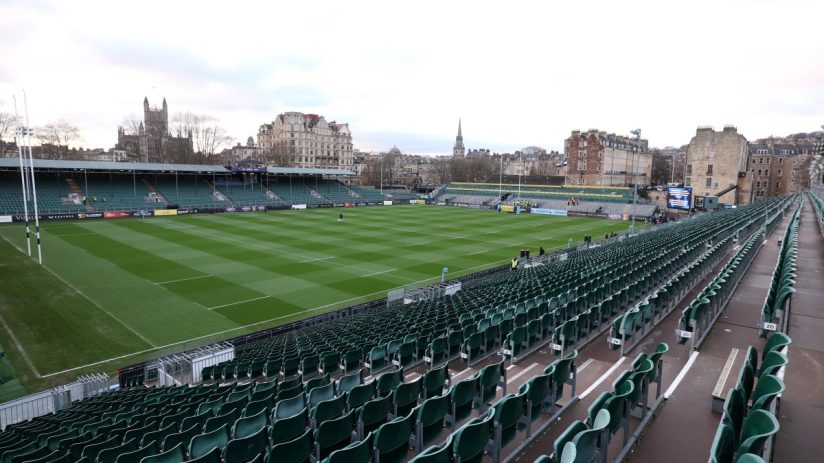 GettyImages 2253705284 featuring a business meeting with diverse professionals discussing corporate strategy in a modern o...