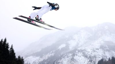 GettyImages 2260187342 featuring a professional business meeting with diverse executives discussing corporate strategies