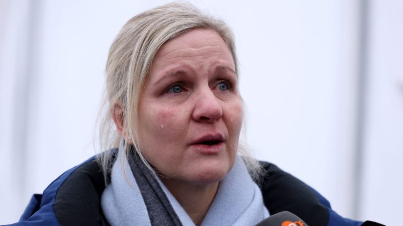 Getty Images news-related visual with diverse professionals in a modern office discussing business strategies and collabor...