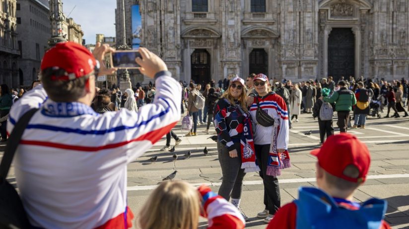 High-resolution aerial view of bustling urban cityscape with skyscrapers and busy streets during daylight, GettyImages 226...