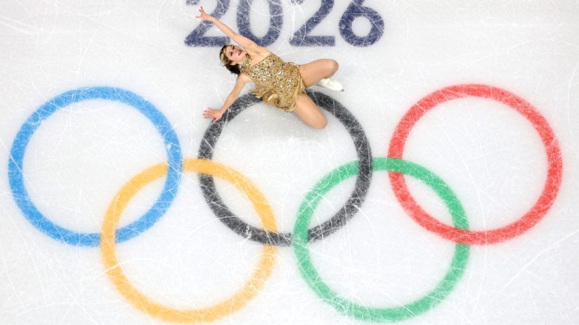GettyImages 2262533221: Business professionals in a meeting discussing market strategies, diverse team collaboration, corp...