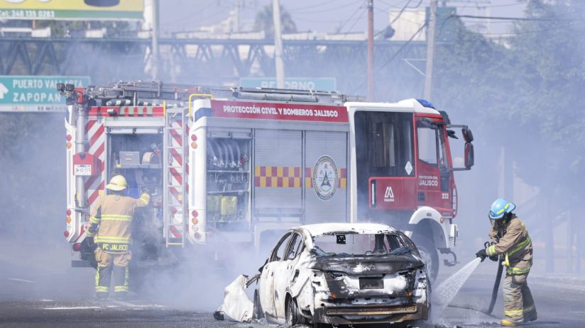 Business professionals discussing financial strategies at a conference table with charts and graphs in a modern office set...