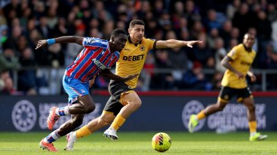 GettyImages 2262955044 likely depicts a business meeting or conference, capturing professionals engaged in discussion and ...