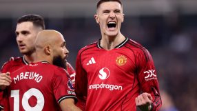 GettyImages 2263198122 depicts a business meeting with diverse professionals discussing strategy in a modern office setting.