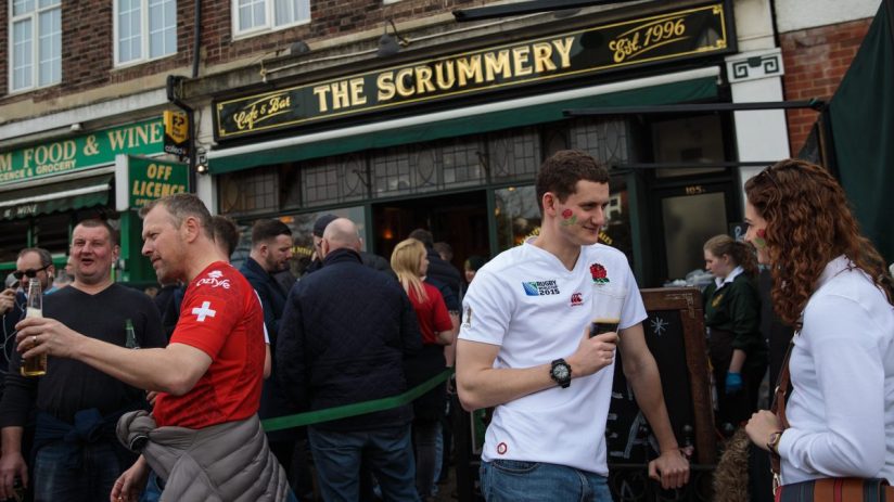 GettyImages 652057454 features a business meeting with diverse professionals in a modern office discussing corporate strat...