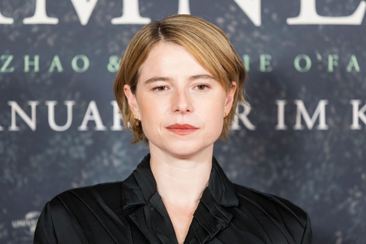 Jessie Buckley as Hamnet star in theatrical costume, showcasing her role in the acclaimed performance.