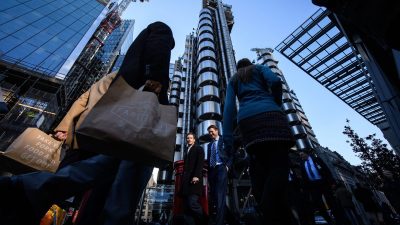 London skyline with iconic insurance buildings under clear sky reflecting the citys financial and business hub atmosphere