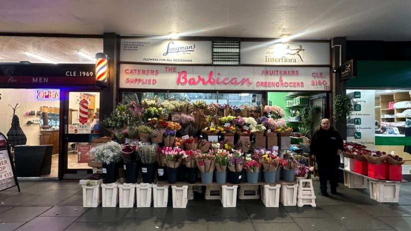 Longmans Florist storefront in the City of London showcasing vibrant floral arrangements and elegant window displays