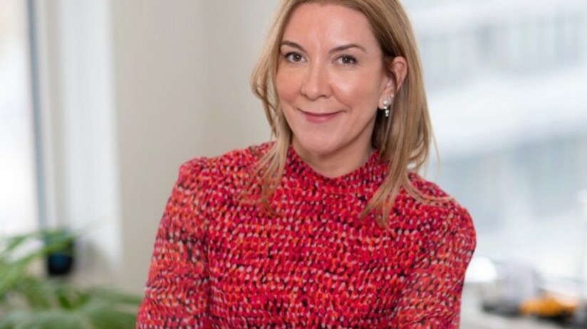 Antonia Romeo, UK Ministry of Justice official, in a formal setting, highlighting leadership and government influence