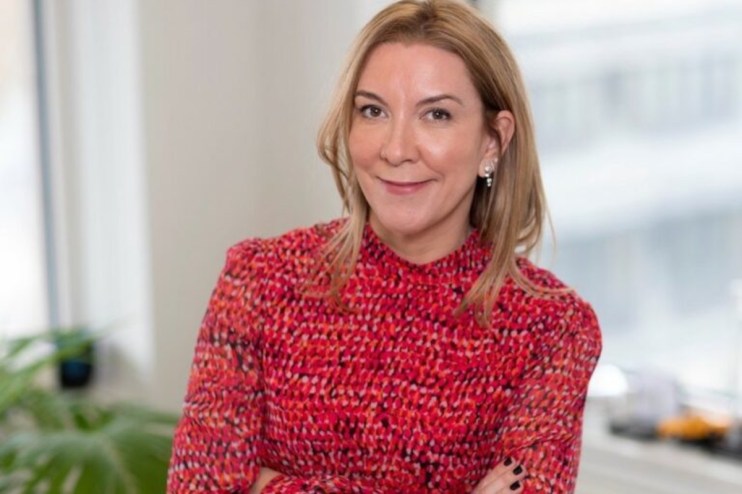 Antonia Romeo, UK Ministry of Justice official, in a formal setting, highlighting leadership and government influence