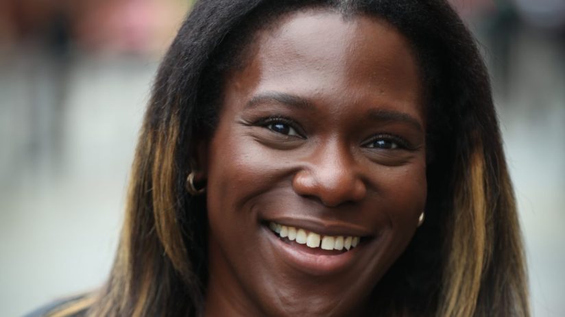 Professional headshot of a person named Newton, suitable for business or news publication, with a neutral background.