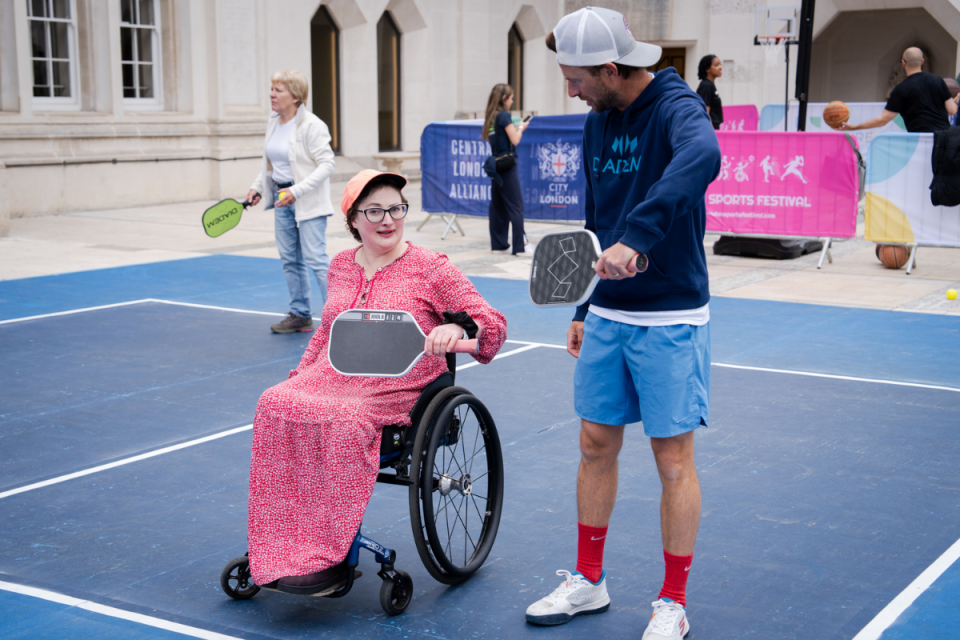 Players enjoying a game of pickleball in Guildhall Yard during the London Sports Festival, showcasing vibrant community en...